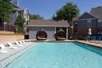 Sparkling pool with outdoor kitchen
